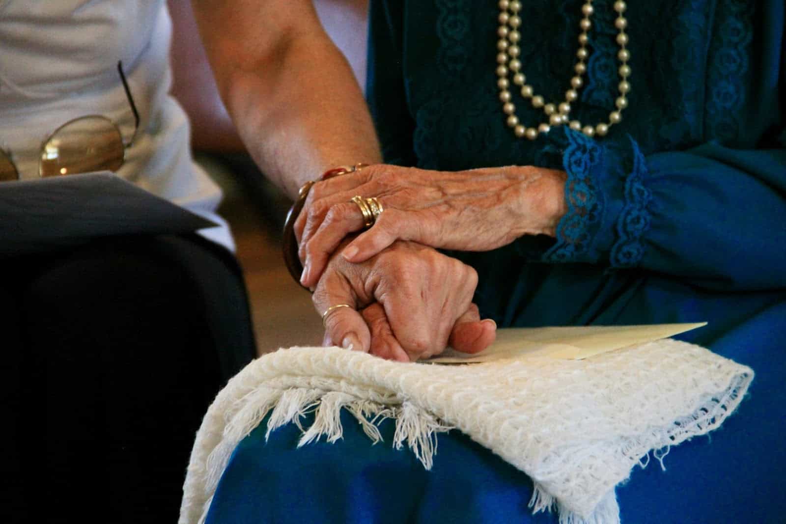 a man and woman holding hands